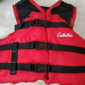 The Cabela's Youth Red General Boating Life Vest, fits 50-90 LBS
